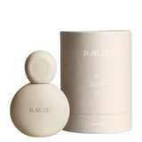 Packaging of RAAIE Sun Milk Drops SPF50, lightweight mineral sunscreen with broad-spectrum UVA/UVB protection and blue light defense