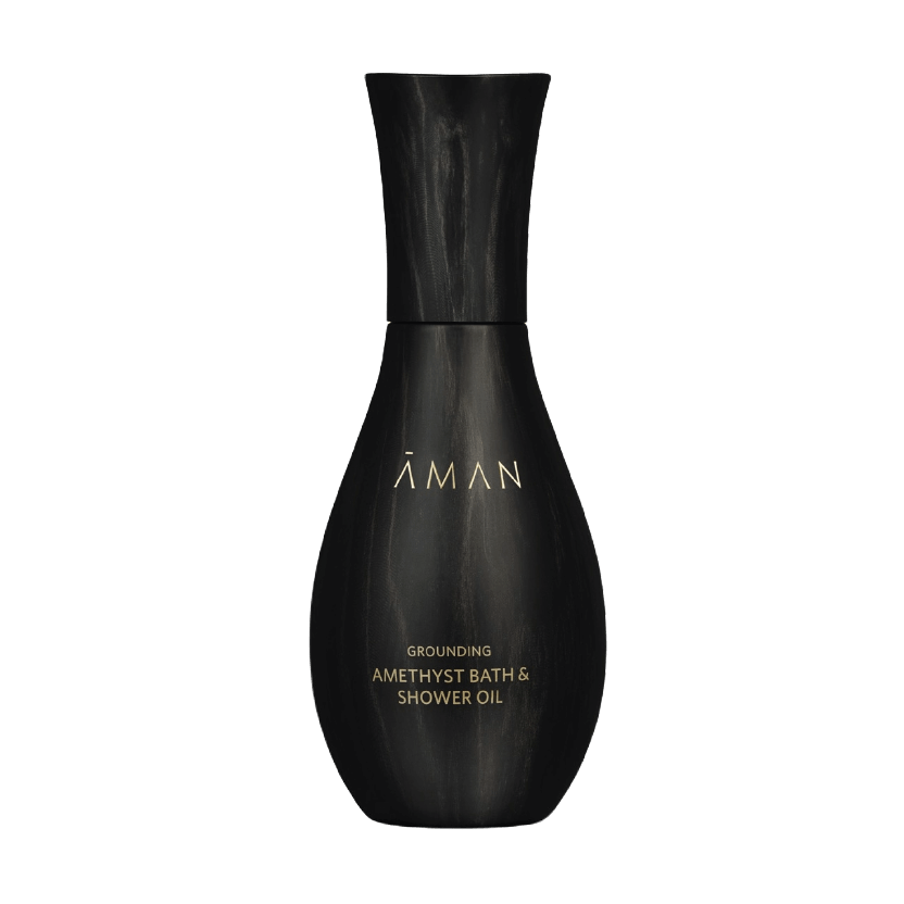 An Uplifting Body Oil Sample - Soothing and comforting formula with Sandalwood, Jasmine, Tuberose, Calendula, and Evening Primrose Oil for conditioned skin and a calm, relaxed mind.